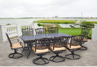 Cast Aluminum dining set with 8 chairs and Tan Cushions