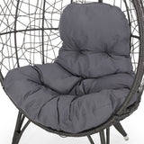 Wicker Tear drop chair with dark gray cushion