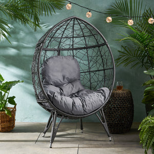 Wicker Tear drop chair with dark gray cushion